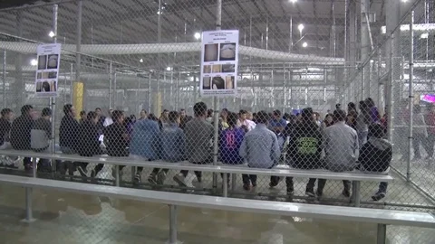 Central Processing Center in McAllen Texas Detaining Illegal Immigrants Видео 97912085