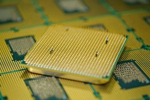 Central processing unit close up showing dense pin layout for high efficiency Photos