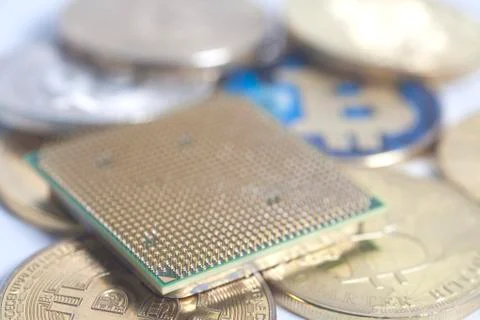Central processing unit CPU microchip with Bitcoins Photos