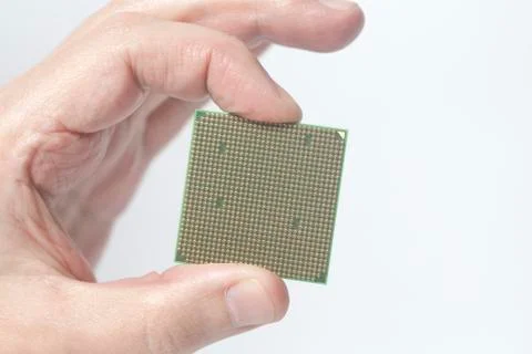 Central processing unit CPU microchip male hand holding 스톡 사진