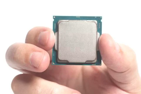 Central processing unit CPU microchip male hand holding Stock Photos