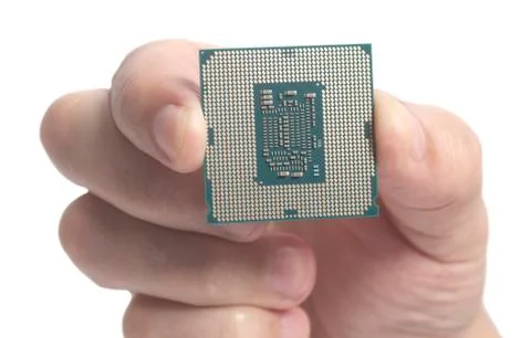Central processing unit CPU microchip processor male hand holding 写真素材