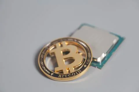 Central processing unit CPU microchip with Bitcoins Stock-Fotos