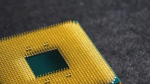 Central processing unit (CPU) outside computer, slow pan left, close up Stock Footage 130093080