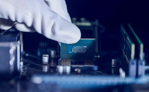 Central Processing Unit (CPU), Repairman computer Installation CPU. Stock Photos