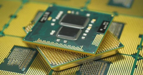 Central processing units with chip sets and golden pins and contacts for laptops Stock Footage 342142516