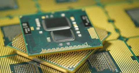 Central processing units with golden pins and contacts for a personal computer Stock Footage 338357682