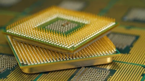 Central processing units with golden pins and contacts for personal computers Video stock 346911745