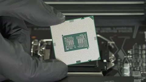 Central processor CPU to socket Motherboard background.  Stock Footage 205160396