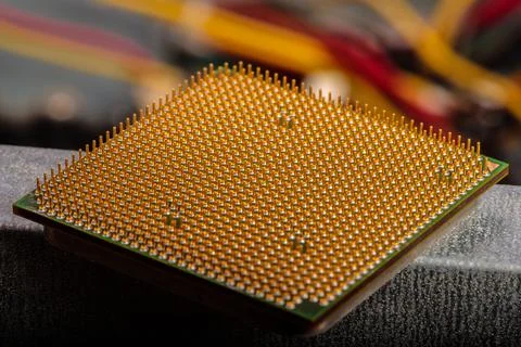The central processor lies on a disassembled computer close-up Stock Photos