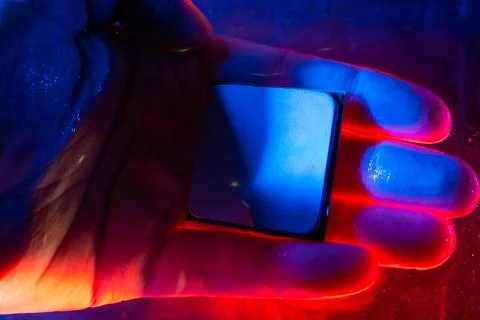 Central processor under water, cpu, blue and red light, under water. Technolo Stock Photos