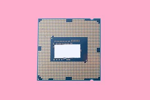 Central Processor unit isolated on pink background at dry sunny day Stock Photos