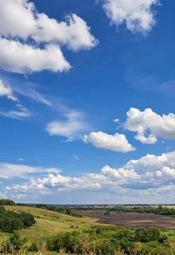 Central Russian landscape against the background of a large sky with clouds Stock Photos