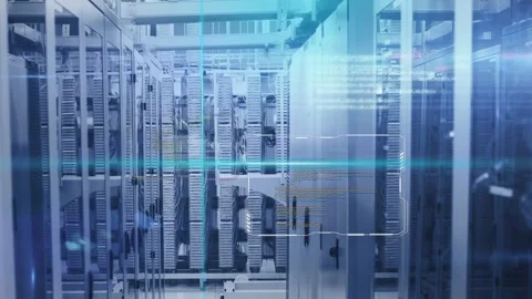 Central server racks seeing turquoise sweep starting HUD scan, camera moving Stock Footage 335732127