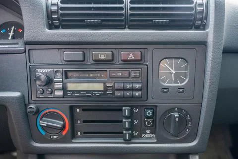 Central side of dashboard of classic BMW E30 car. Stock Photos