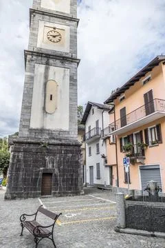 Central square  with bell tower and fountain in Re in Vigezzo Valley Stock Photos