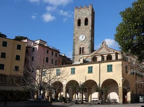 Central square with bell tower and clock in Monterosso, Italy. Historic center Stock Photos