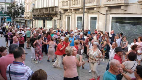 In the central square of Braga, in the center of the old town, people relax and Stock Footage 216683078