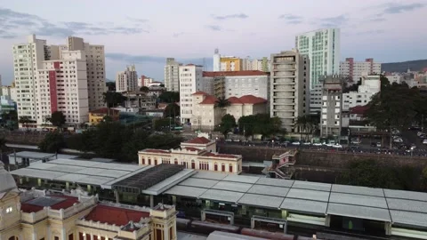 Central station with cargo train passing by in downtown Stock-Footage 156076575