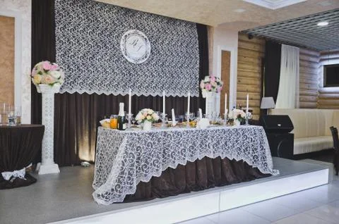 Central table for the main guests of the celebration 8923. Stock Photos