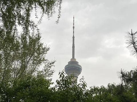 Central Television Tower Beijing spring evening before strong wind Stock Photos