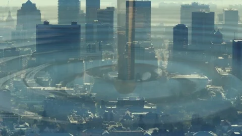 Central tower sending expanding ripple rings after faint distortion, signaling Stock Footage 340654654