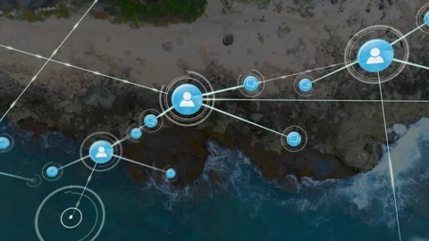 Central user node pulsing and sending lines, network expanding across coastline Video stock 330355961