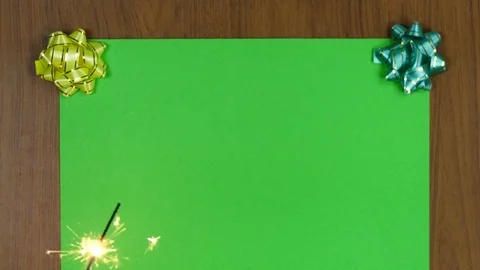 Centrally positioned burning sparkler floating in the air on green screen 스톡 동영상 84980085