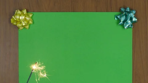 Centrally positioned burning sparkler floating in the air on green screen backgr 스톡 동영상 92332466