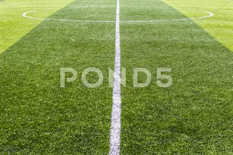 Centre soccer green field background Stock Photos
