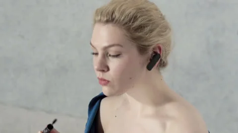 CEO applies makeup Stock Footage 24975644