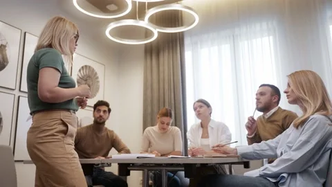 CEO leader discussing projects with colleagues at board meeting Video stock 218615296