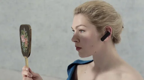 CEO looking in mirror after applying makeup Stock Footage 25005624