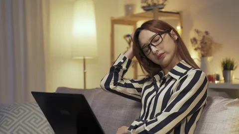 Ceo sitting on sofa with notebook is suffering Stock Footage 148195404