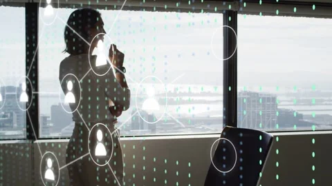 CEO standing at window, pen chin, watching node emerging, network layering over Stock Footage 333999130