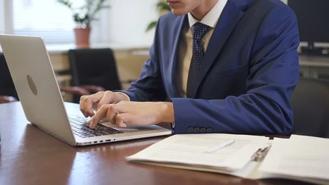 Ceo working online, using contract and laptop computer. Stock Footage 101805337