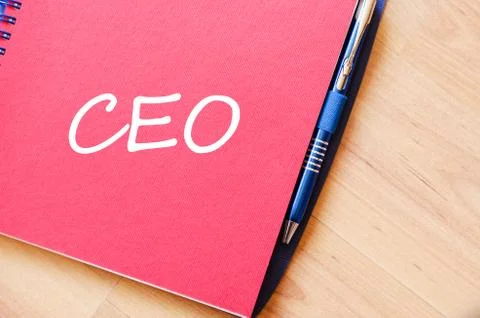Ceo write on notebook Stock Photos