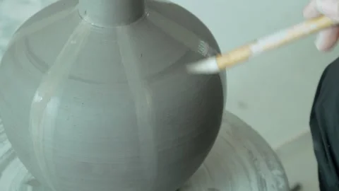 Ceramic Artisan Applying Chu Jin Raised Vein Technique to Vase Stock Footage 338184018