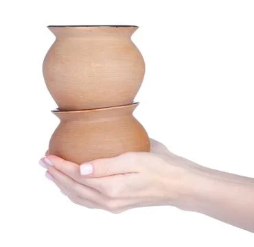 Ceramic baking pots in hand Stock Photos