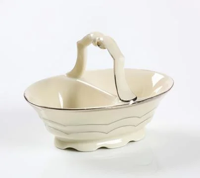 Ceramic basket with handle for kitchen use Photos