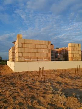 Ceramic block house under construction at evening Stock Photos
