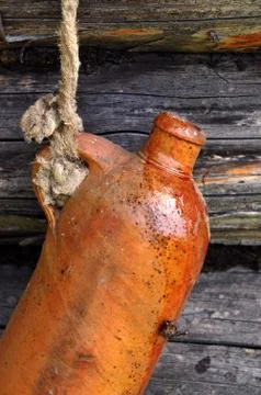 Ceramic bottle on the rope Stock Photos