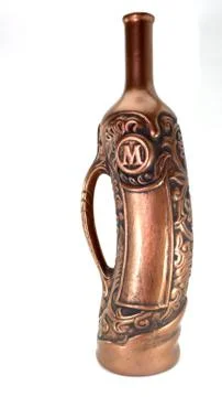 Ceramic bottle for wine with a handle on the left side on a white background Stock Photos