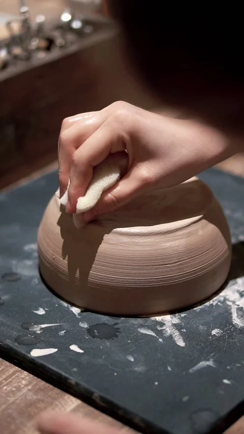 Ceramic bowl making. Close-up ceramic bowl. Clay dish with hands Stock Footage 201601704