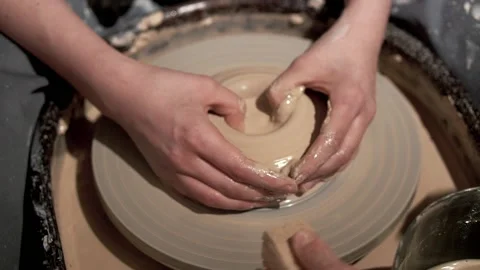 Ceramic bowl making with young lady hands on turntable Stock Footage 201568446