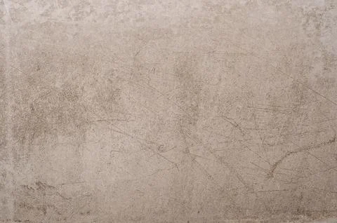 Ceramic brown tile with rough abstract stone surface pattern Stock Photos