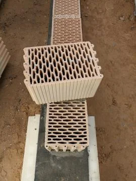 Ceramic building block close up in constructions Stock Photos