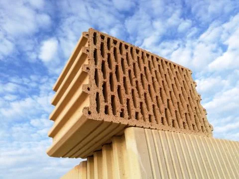 Ceramic building block close up in front of blue sky Stock Photos