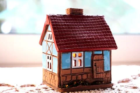 Ceramic candlestick in the form of a house Stock Photos