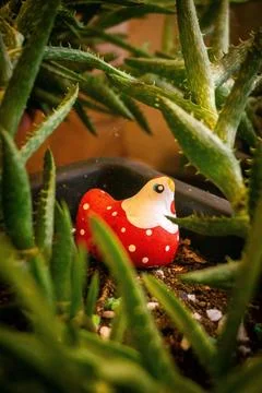Ceramic Chickens in Cacti Stock Photos